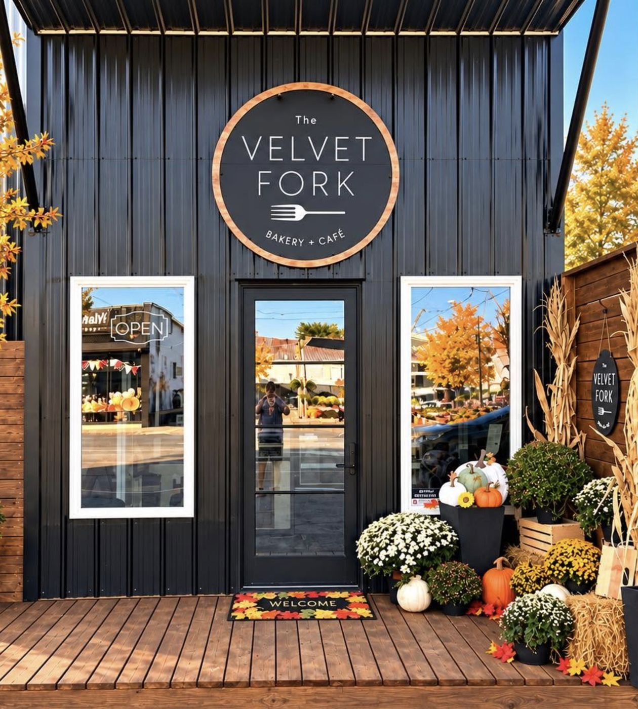 The Velvet Fork storefront on Main Street, decorated for fall